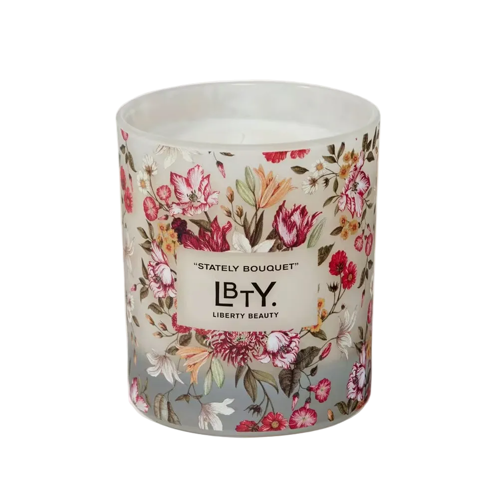 Floral-patterned candle with 'Liberty Beauty' branding on a white background