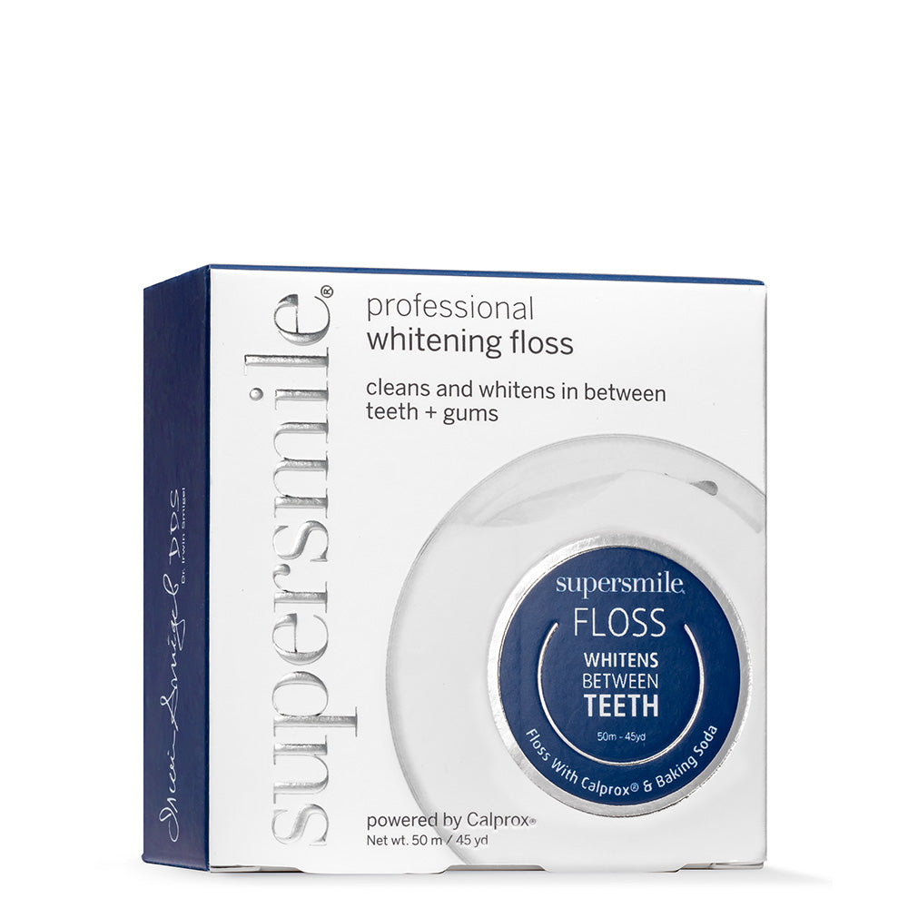 Supersmile professional whitening floss packaging on a white background