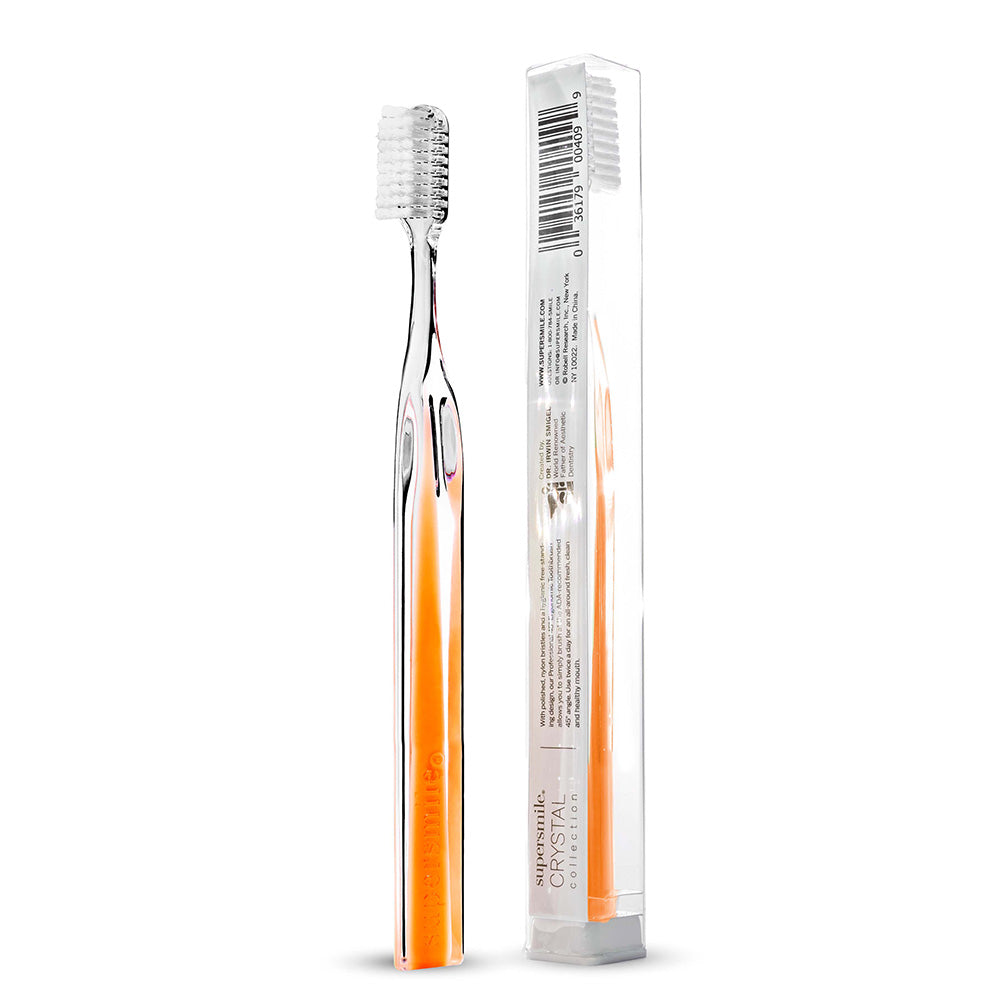 Supersmile Orange toothbrush with clear packaging on a white background