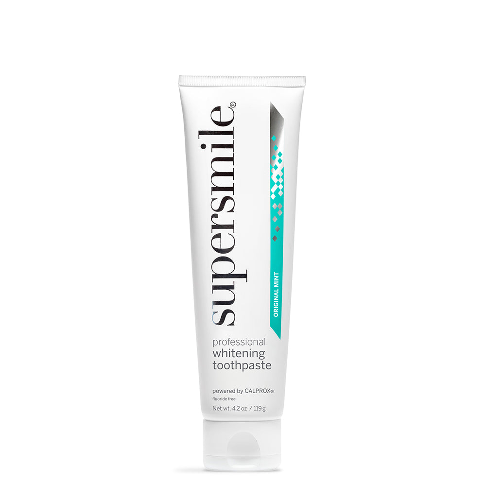Supersmile professional whitening toothpaste tube on a white background
