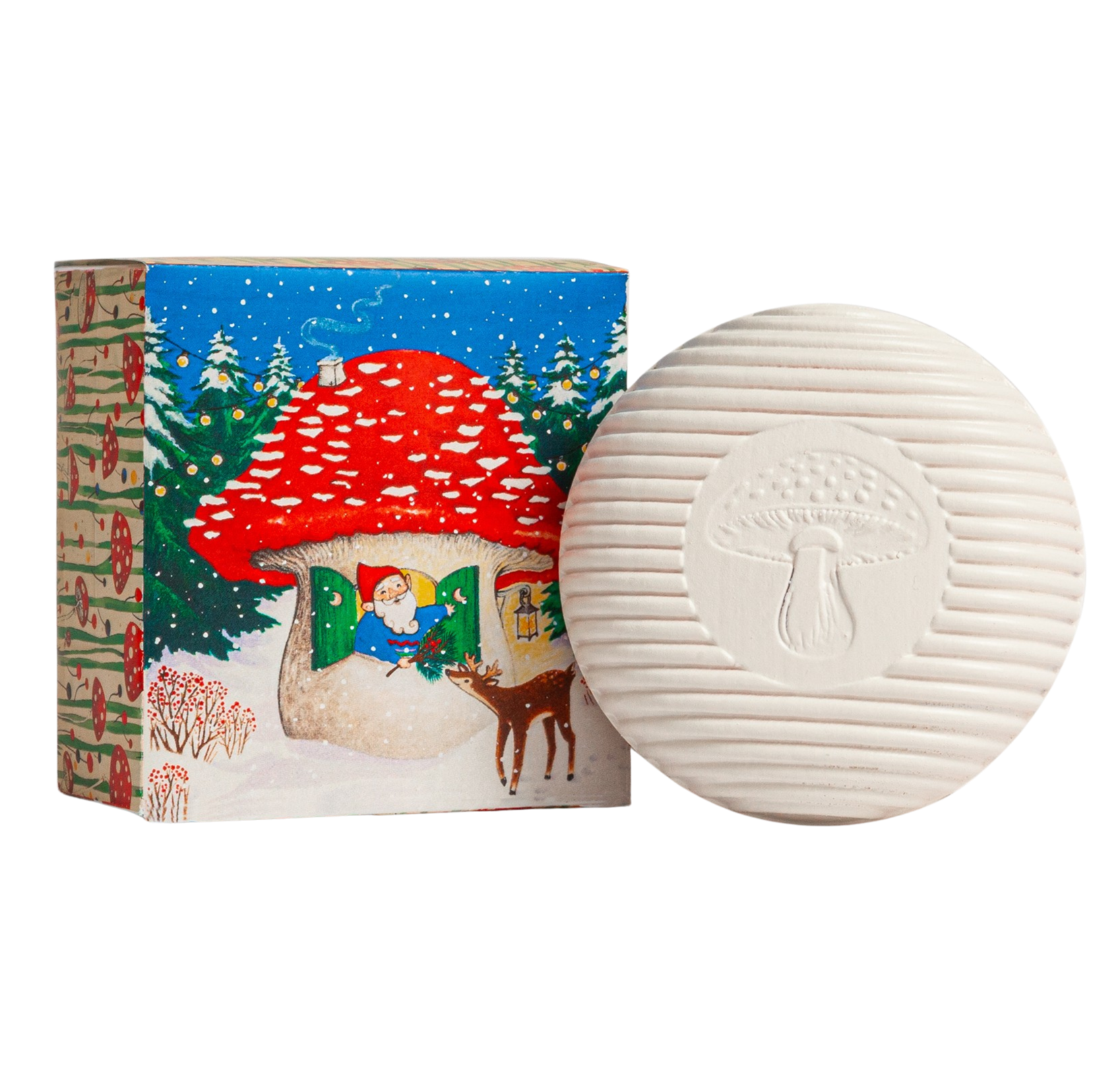 White textured soap Gnome Soap with a mushroom imprint next to a decorative box with a fairy tale .design