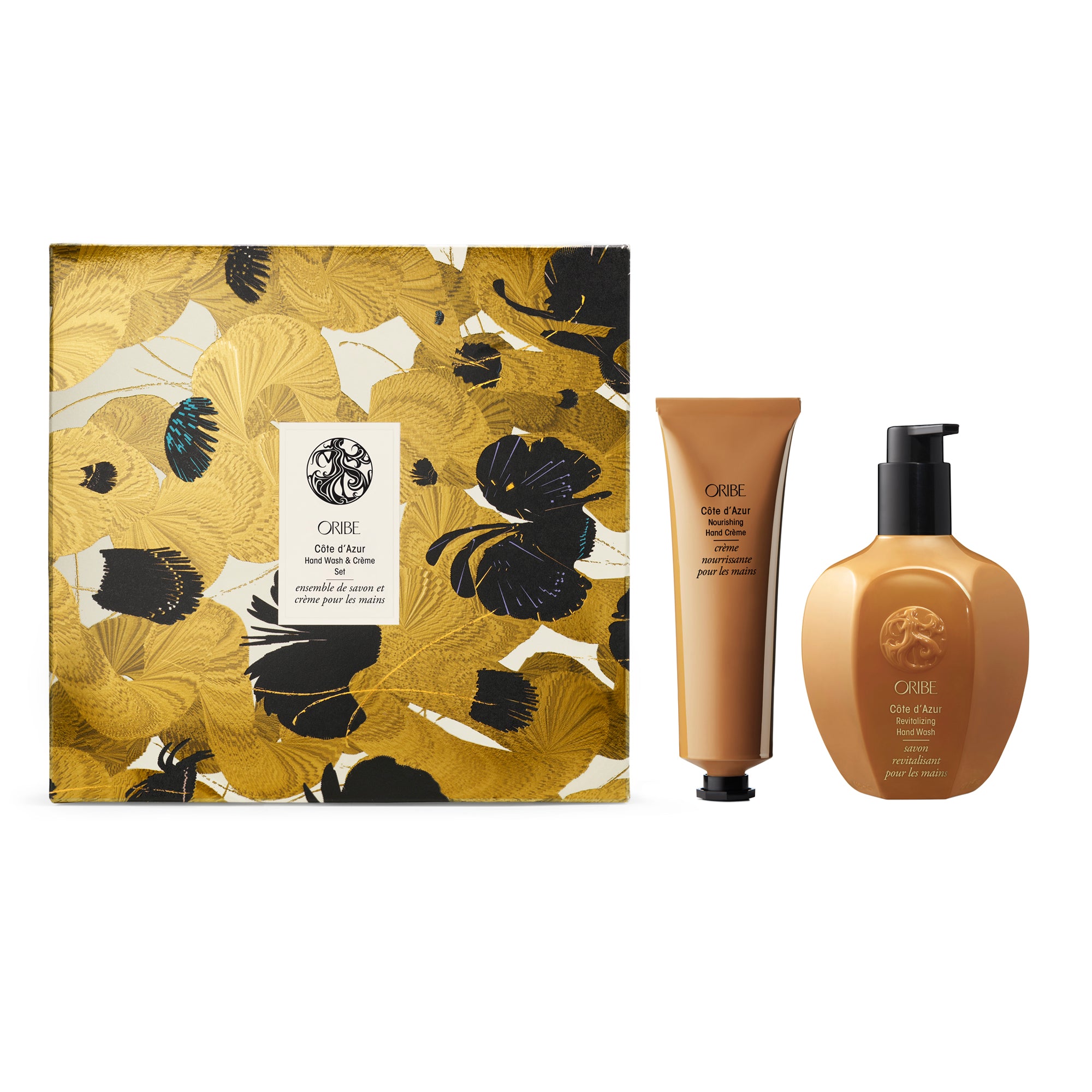 Oribe hair care product set with floral packaging on a white background