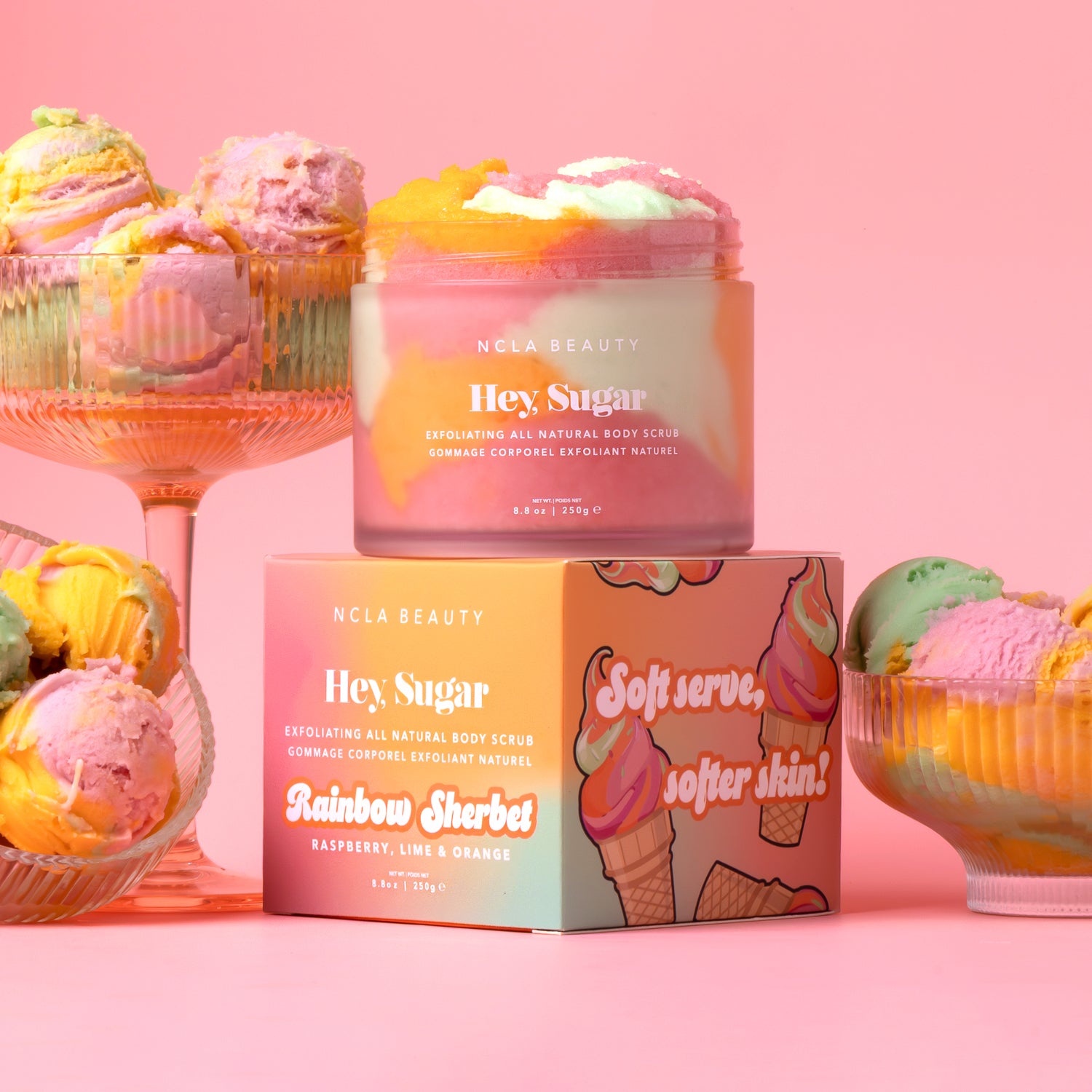 NCLA Beauty 'Hey Sugar' body scrub with packaging on a pink background