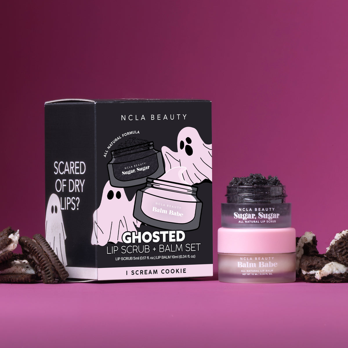 NCLA Beauty Ghosted Lip Scrub + Balm Set in 'I Scream Cookie' flavor, featuring a black box with white ghost illustrations and a jar with a pink lid and dark gray balm visible inside. 
