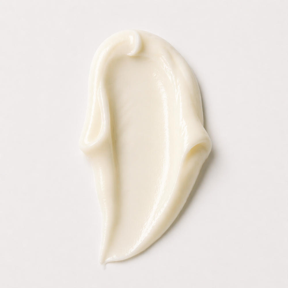 White cream swatch on a light gray background