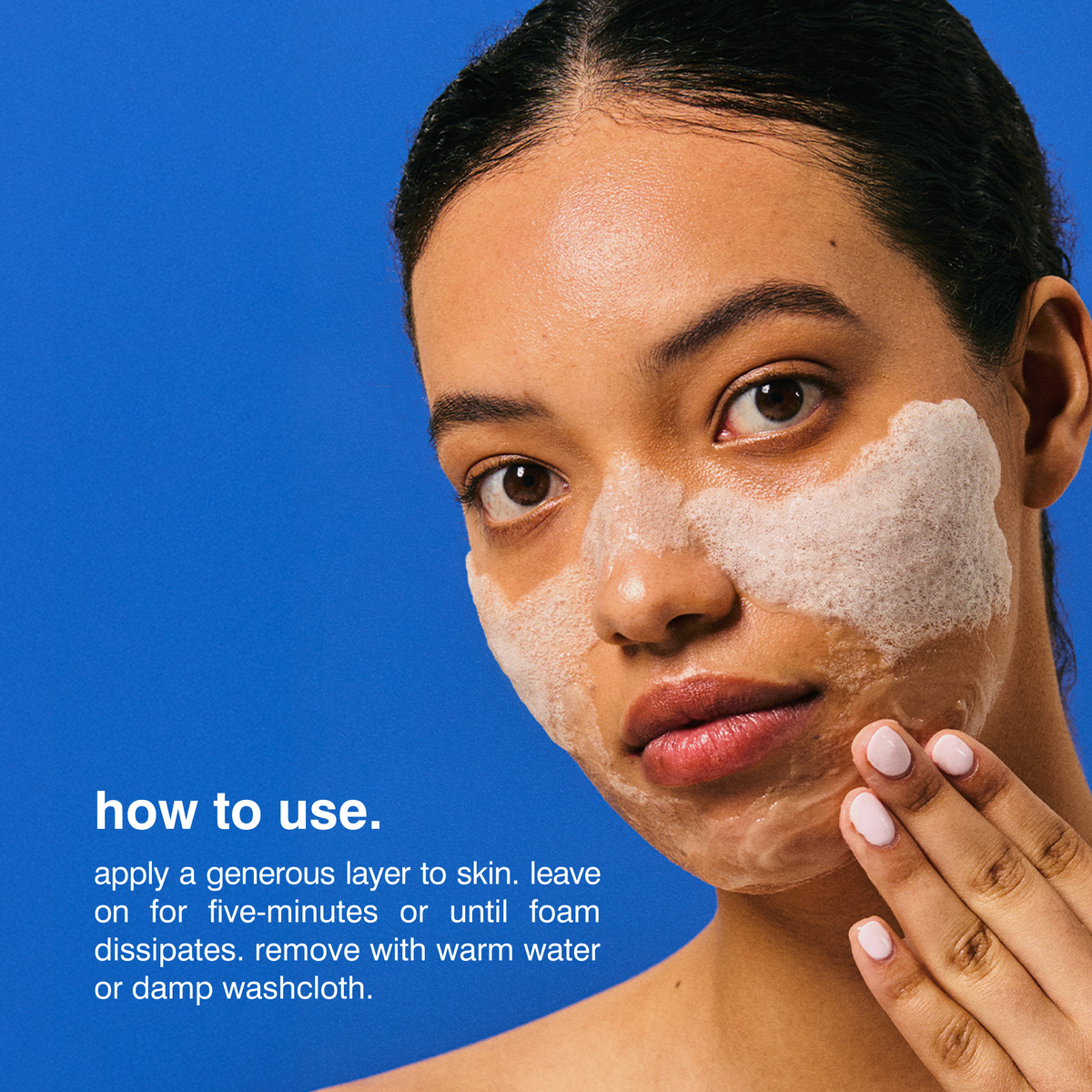 A woman with white foam makeup on her face applies product with her hand against a bright blue background, with text reading 'how to use.' and instructions about applying and removing the foam.