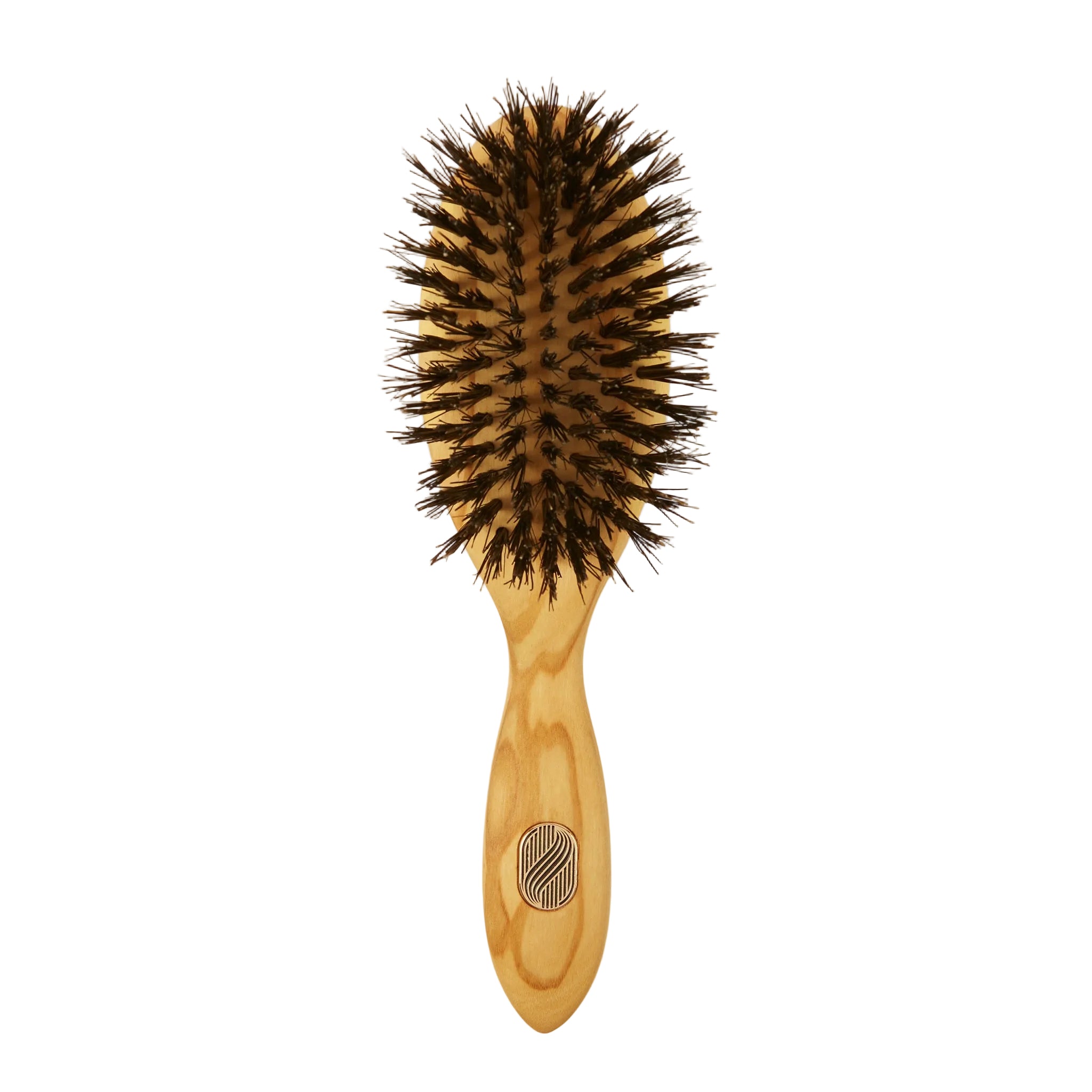 A wooden hairbrush with dark brown bristles and a light natural wood handle, featuring a circular metal logo on the handle, set against a plain off-white background.