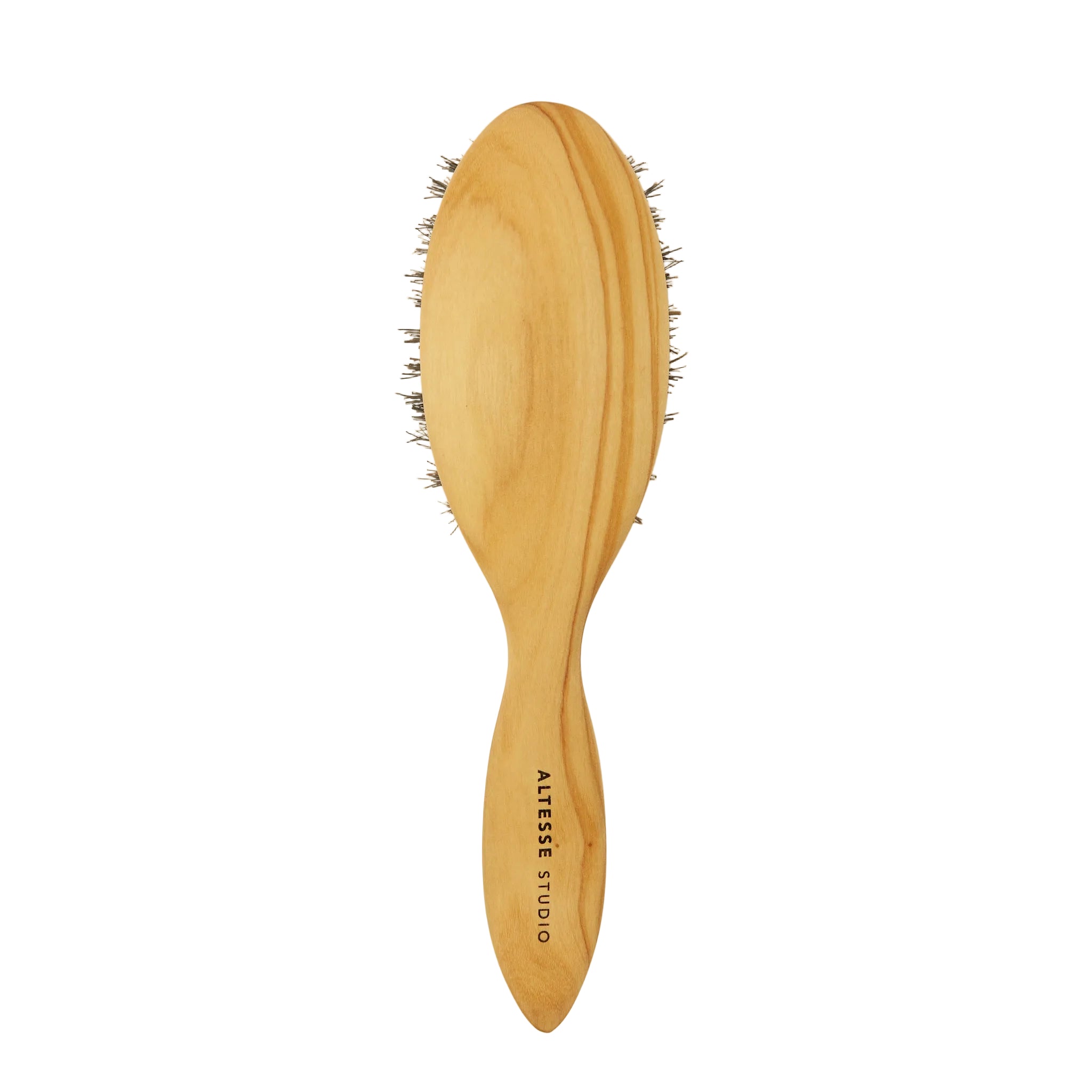 A wooden hairbrush with a light natural wood handle and oval head, featuring dark bristles and the text 'ALEXESE STUDIO' printed on the handle, set against a solid off-white background.