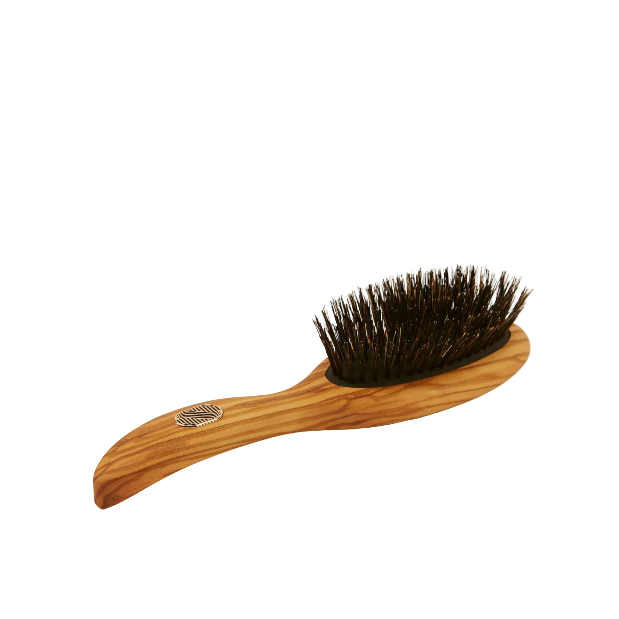 A wooden hairbrush with a curved olive wood handle and dark brown bristles, photographed on a clean, solid off-white background.