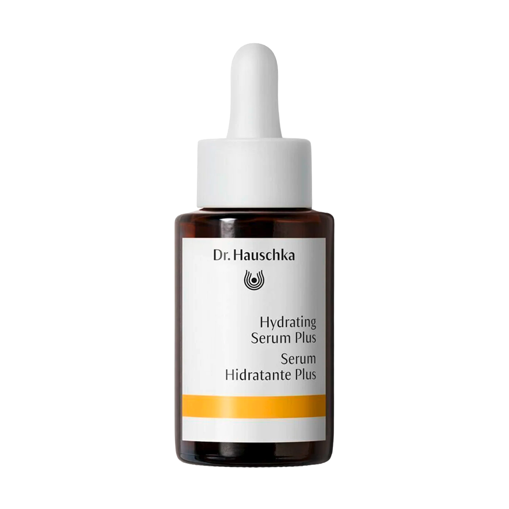 Dr. Hauschka Hydrating Serum Plus in an amber glass dropper bottle with a white label and white dropper cap, isolated on a white background.