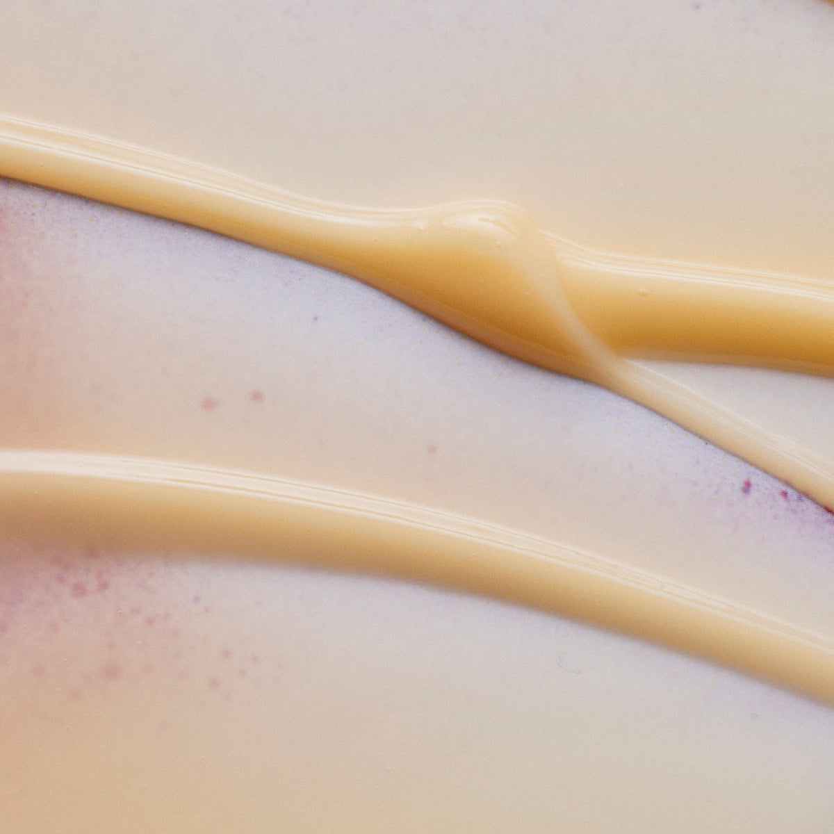 Close-up of a smooth, beige-colored surface with a subtle gradient.