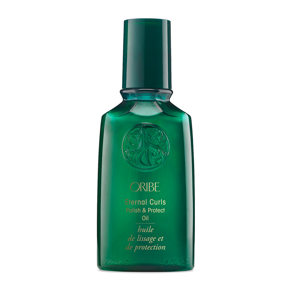 Green bottle of Oribe Eternal Curls Polish & Protect Oil on a white background