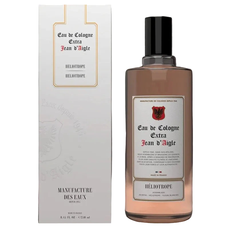 Eau de Cologne bottle and packaging on a gray background