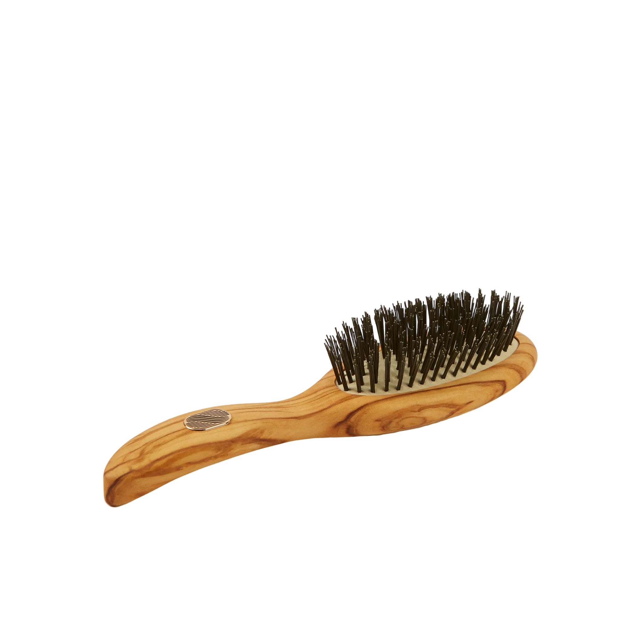 Wooden hairbrush with bristles on a white background