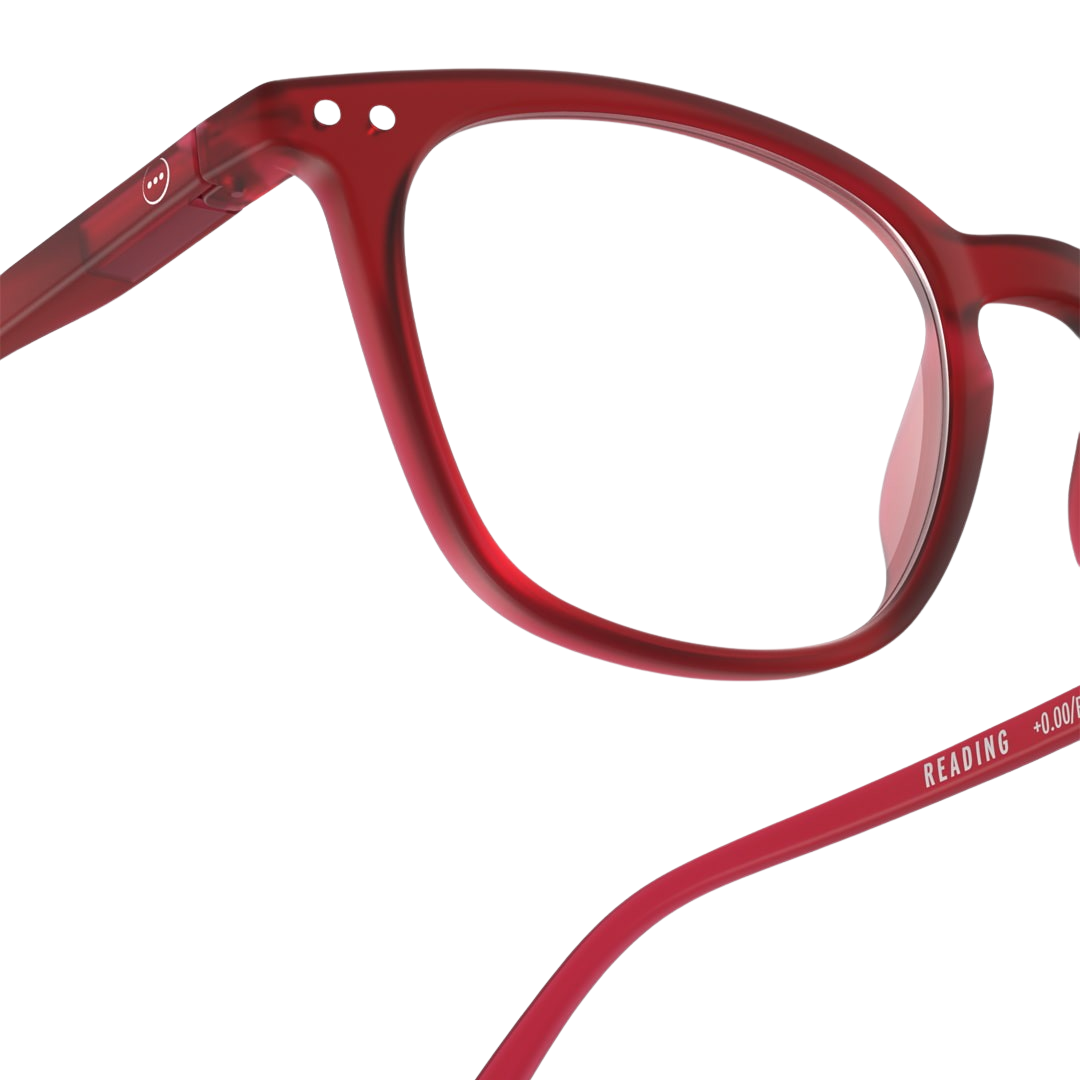 Red eyeglasses on a white background