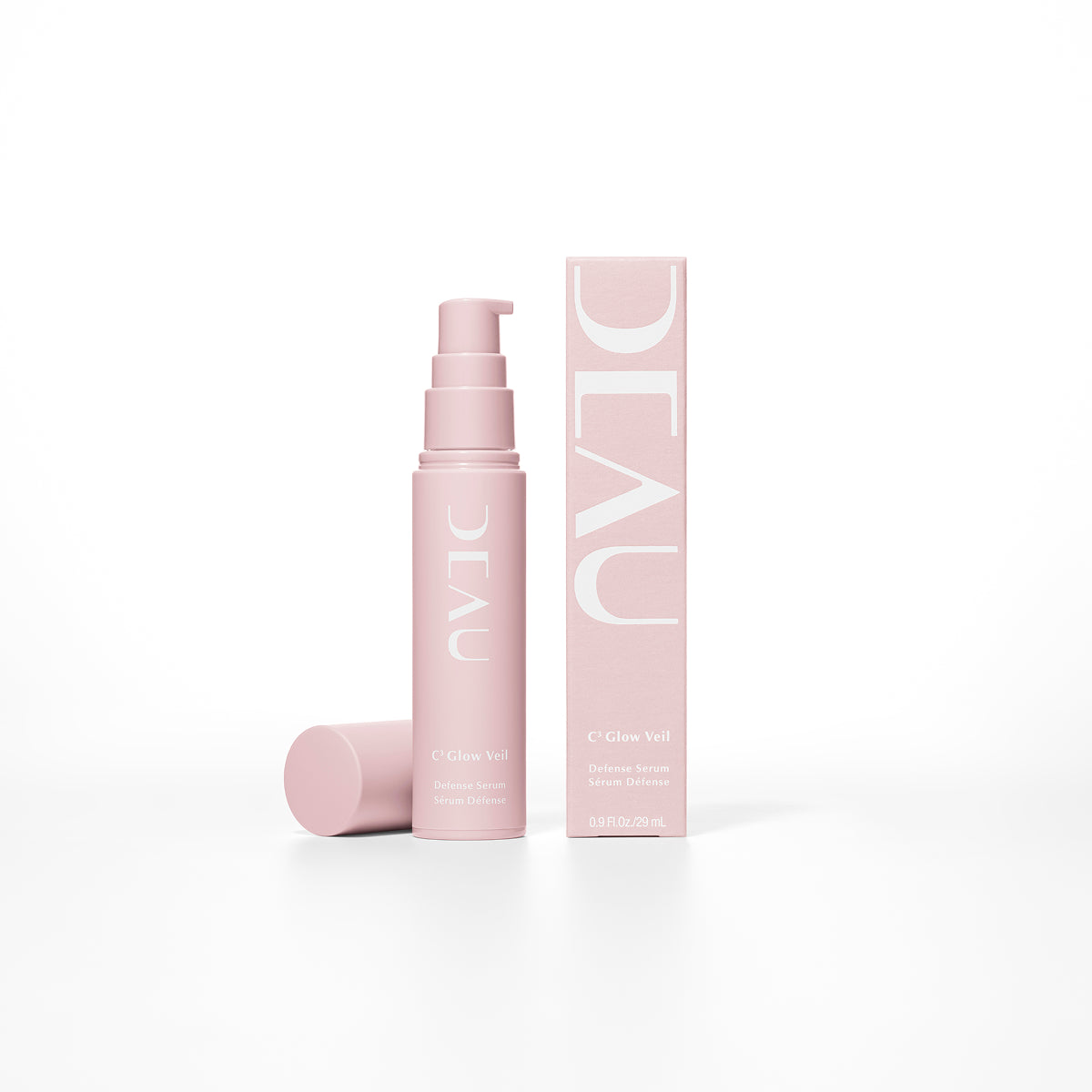 Pink skincare product with packaging on a white background