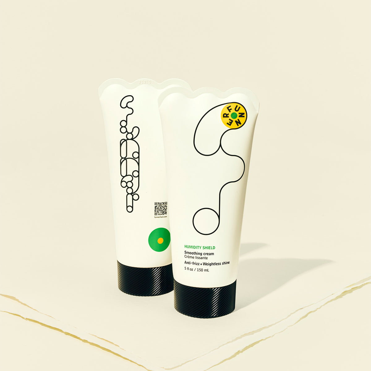 Two tubes of Smoothing Cream on a beige background