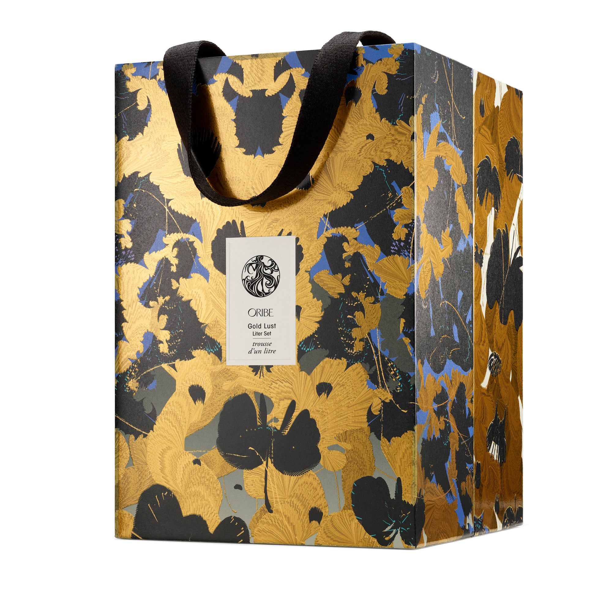 Decorative gift bag with floral pattern and visible brand label on a white background