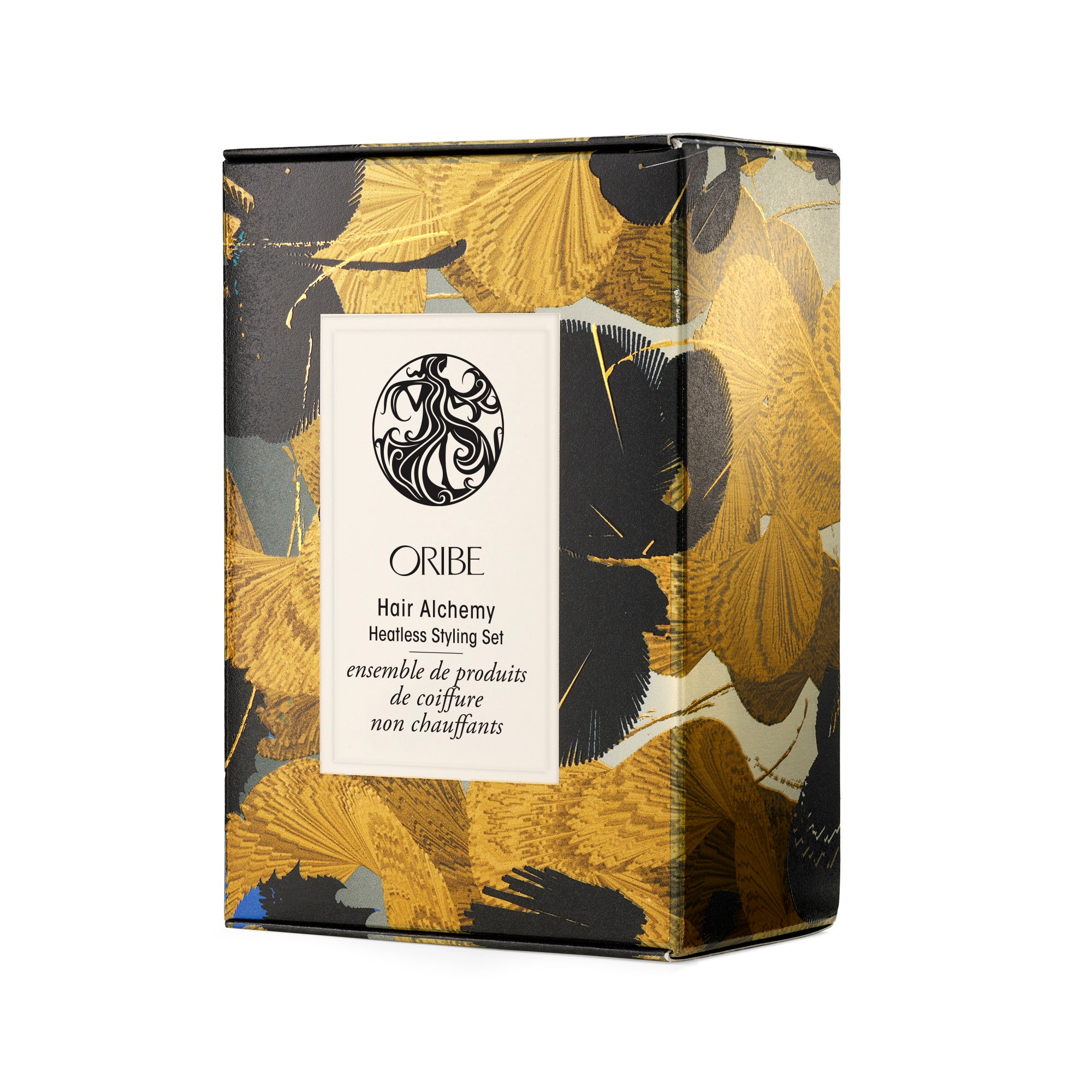 Oribe Hair Alchemy product set packaging with floral design