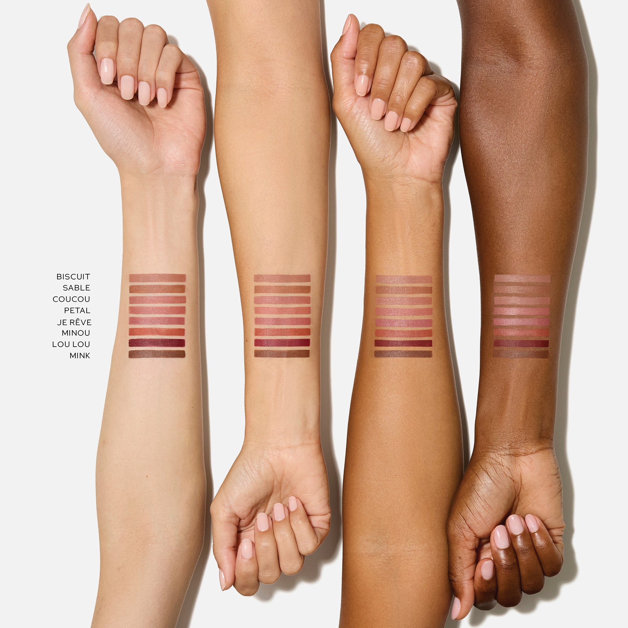 Westman Atelier Lip Liners swatched on four arms with different skin tones. 