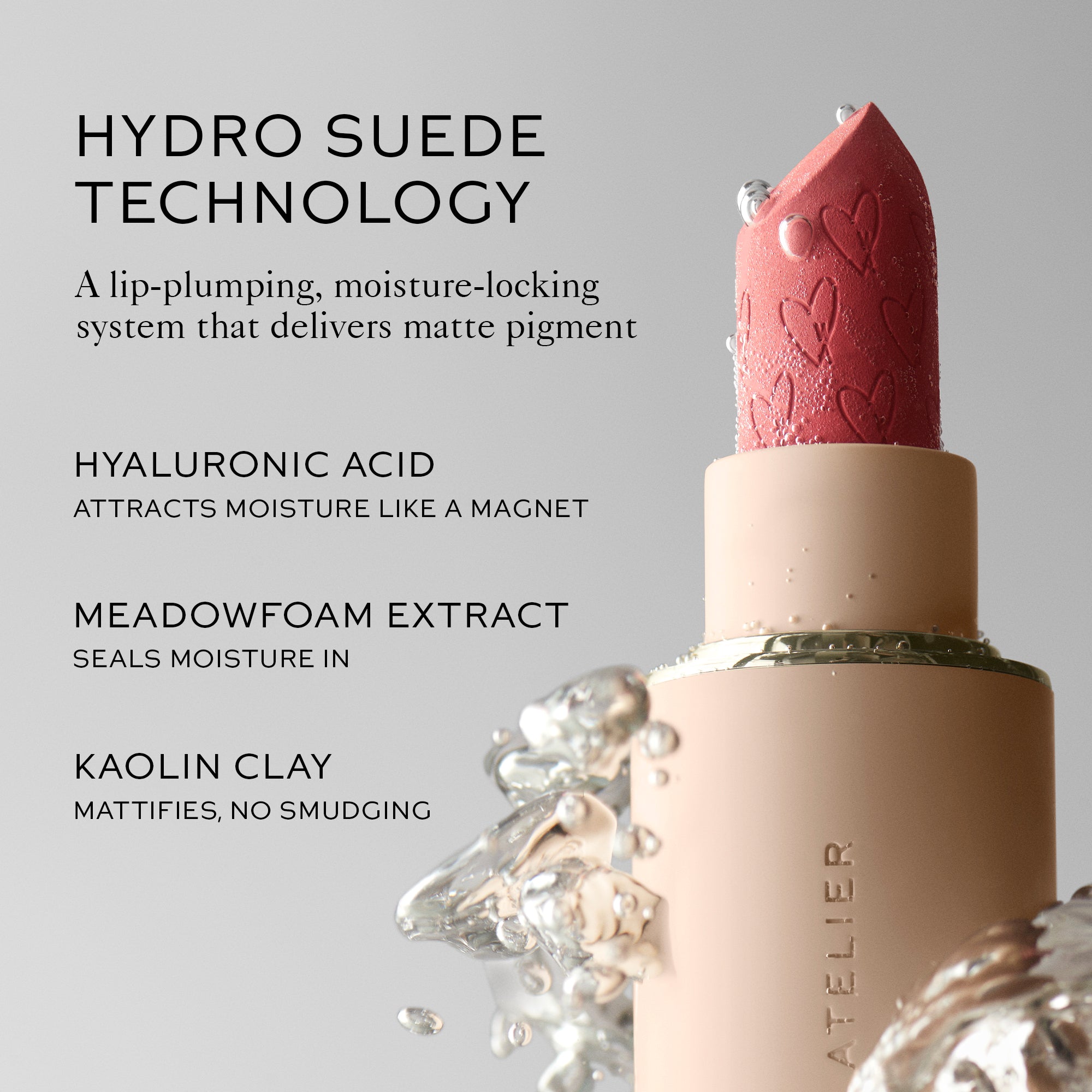 Lipstick with text about hydro suede technology, hyaluronic acid, meadowfoam extract, and kaolin clay on a gray background.