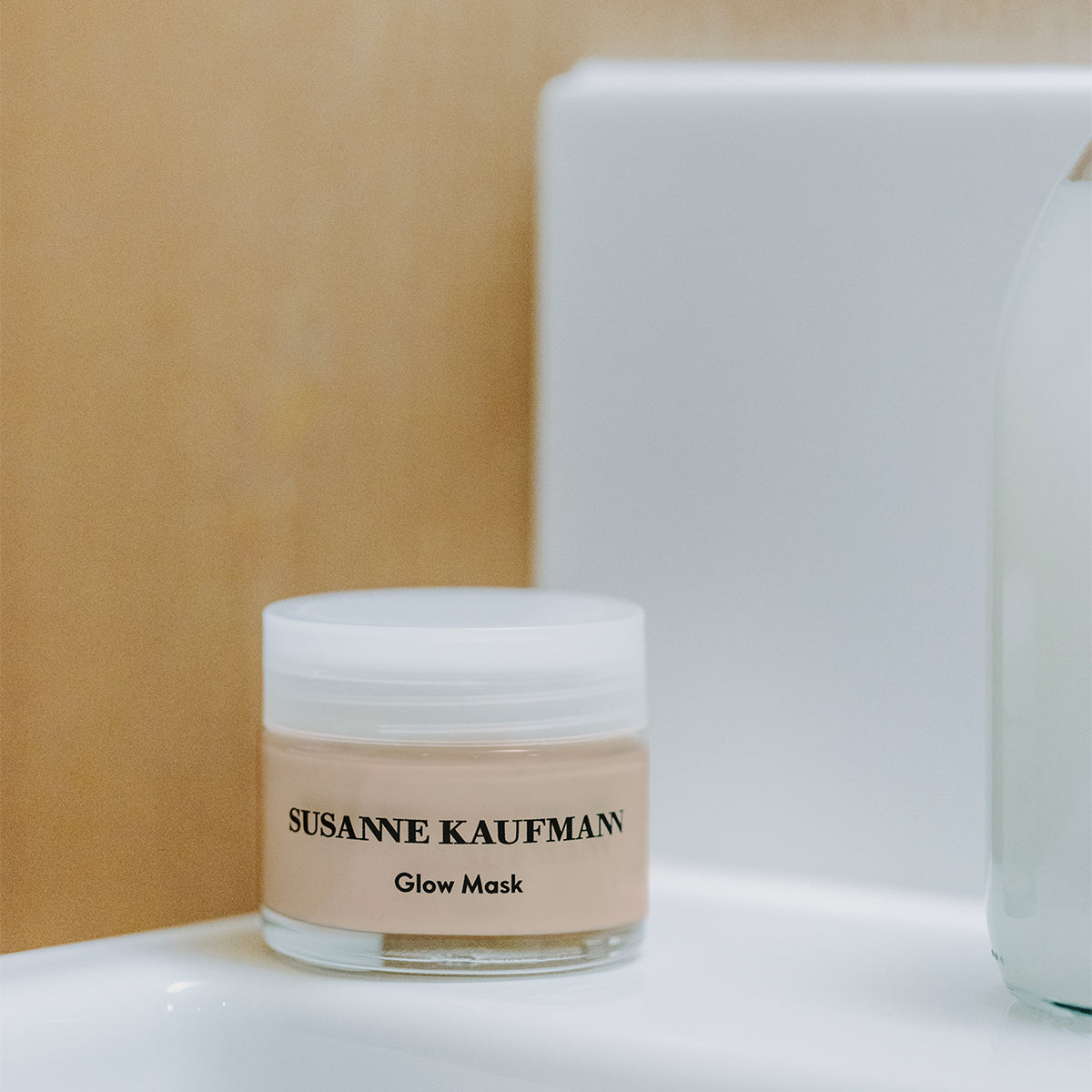 Susanne Kaufmann Glow Mask  sitting on a white surface