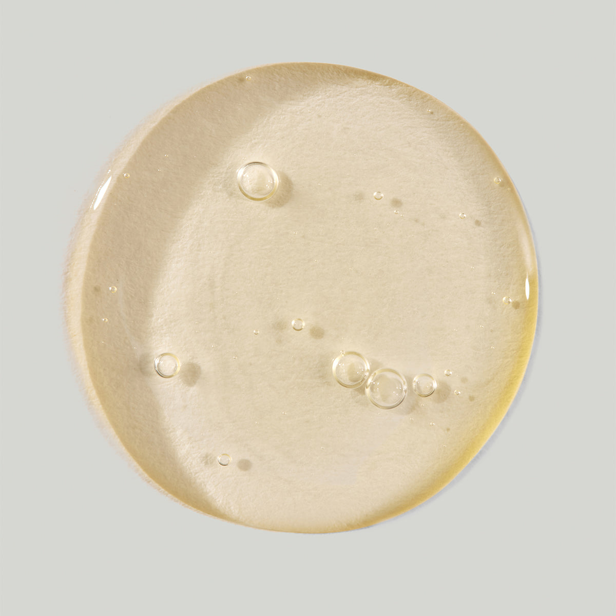Round product swatch on a light gray background