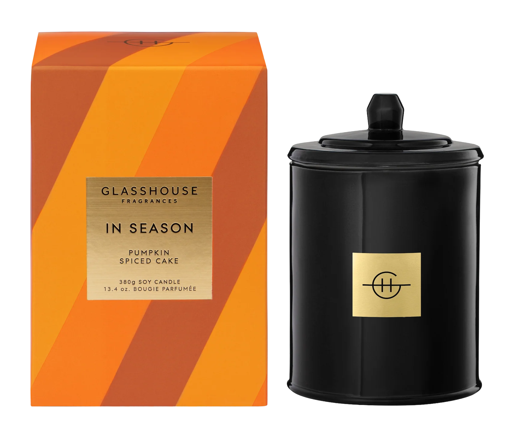 Black candle with lid and 'Glasshouse Fragrances' packaging on a white background