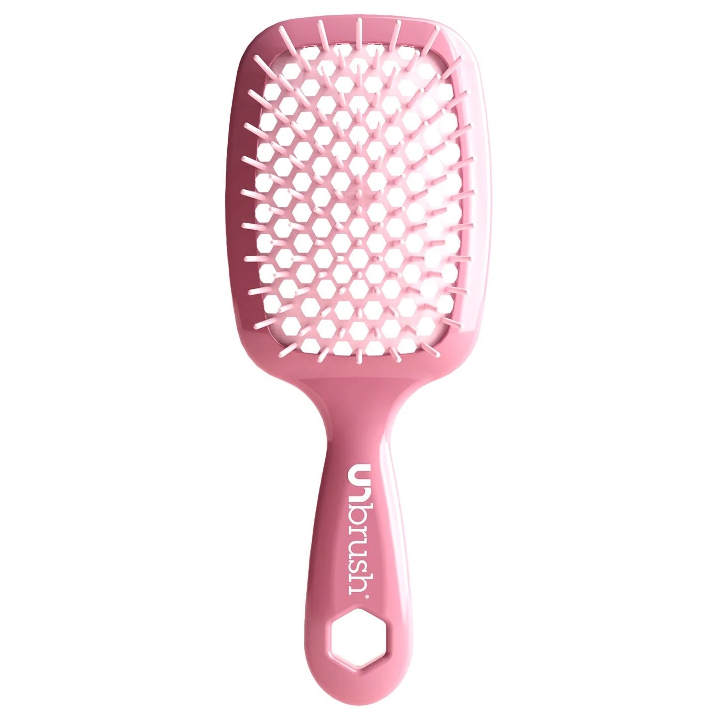 Pink hairbrush with 'Unbrush' branding on a white background