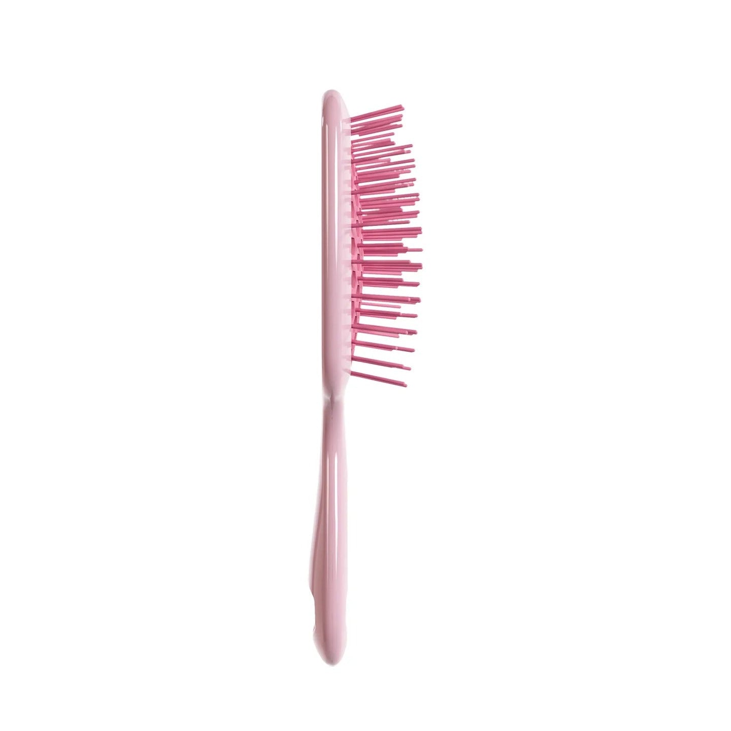 Pink hairbrush on a white background