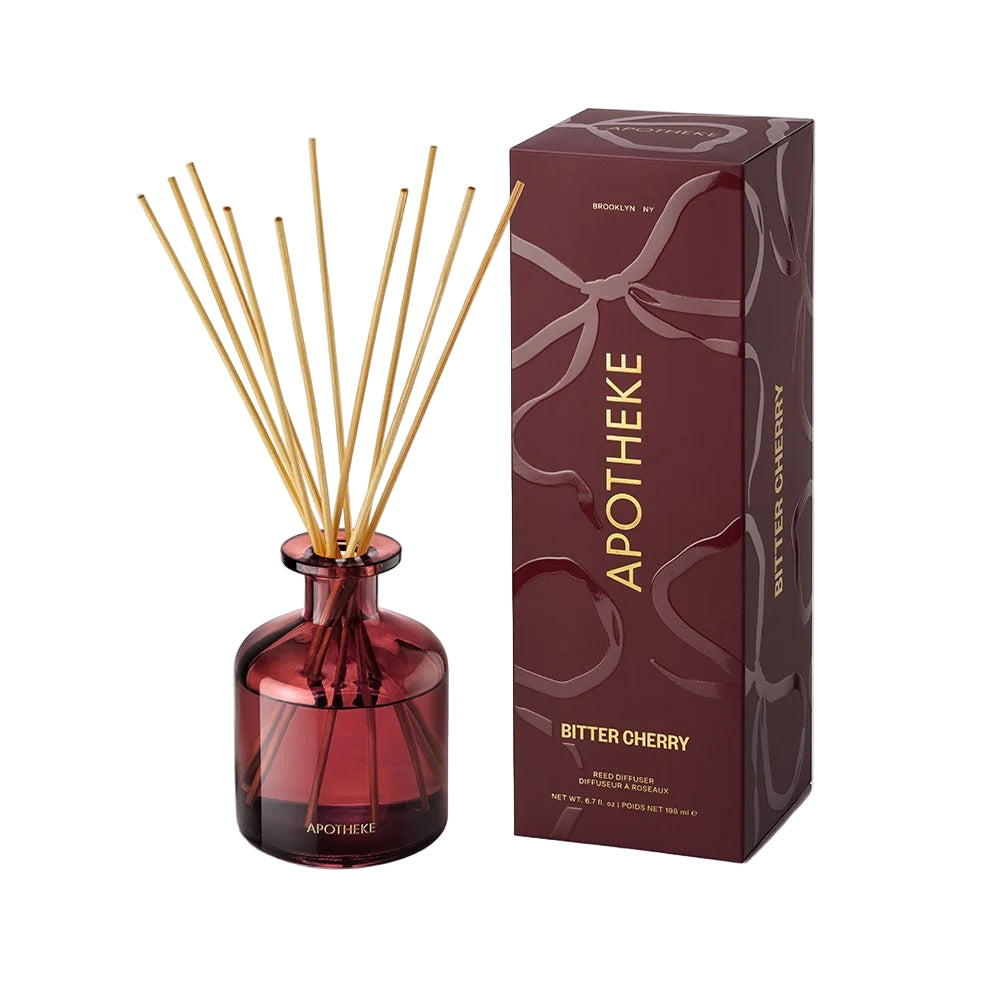 Apotheke Bitter Cherry diffuser with packaging on a white background