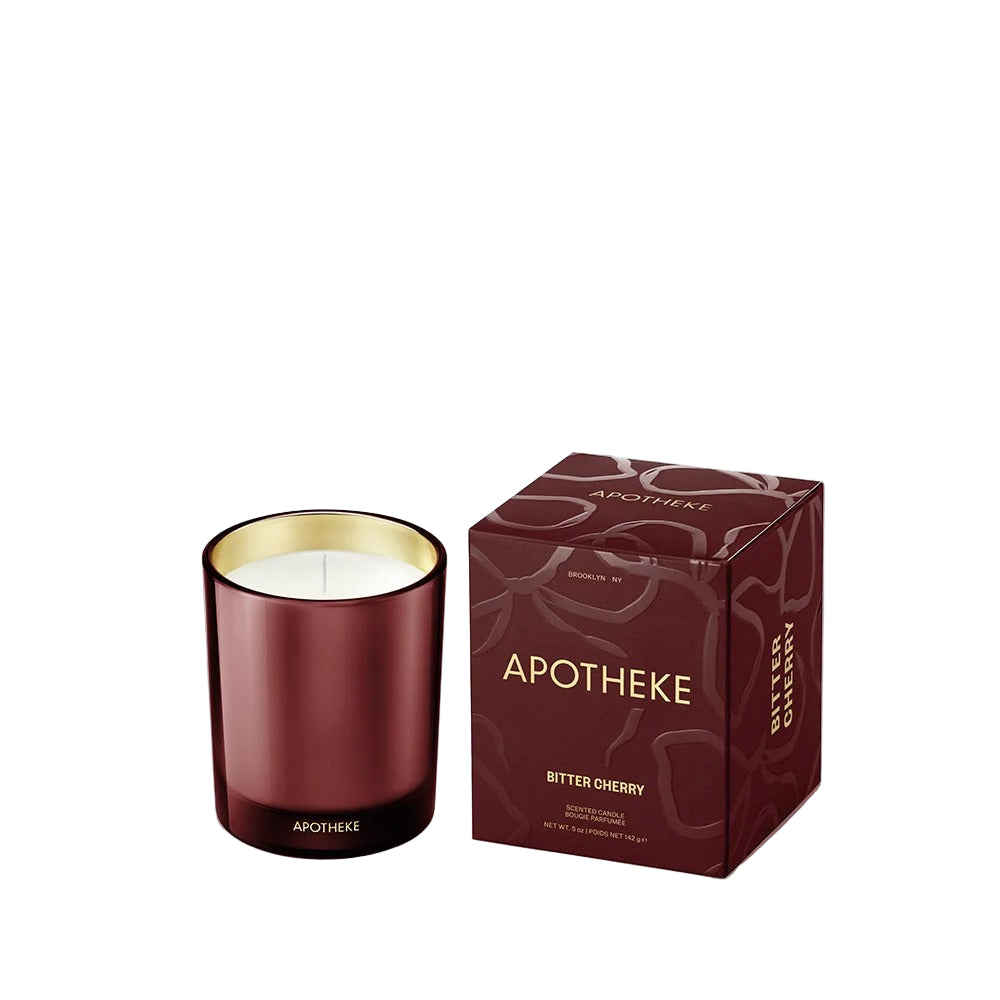 Apotheke Bitter Cherry candle with packaging on a white background