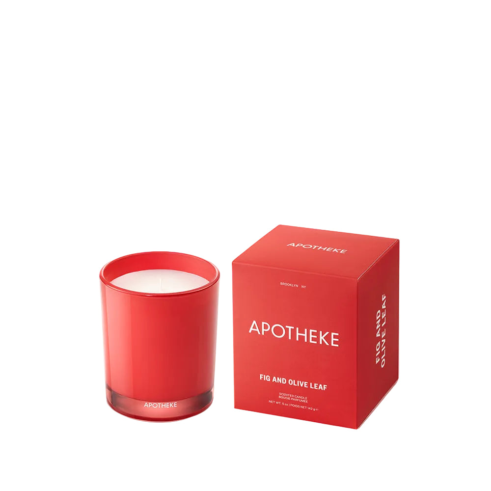 Red candle and box with 'Apotheke' branding on a white background