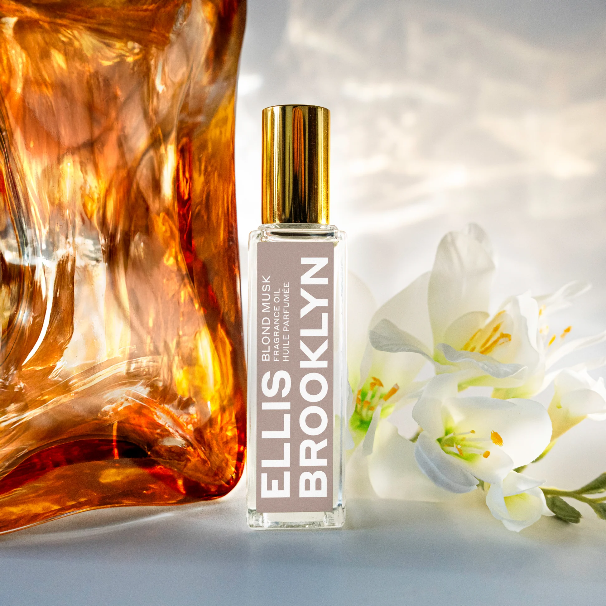 Ellis Brooklyn Blond Musk bottle with amber and flower elements