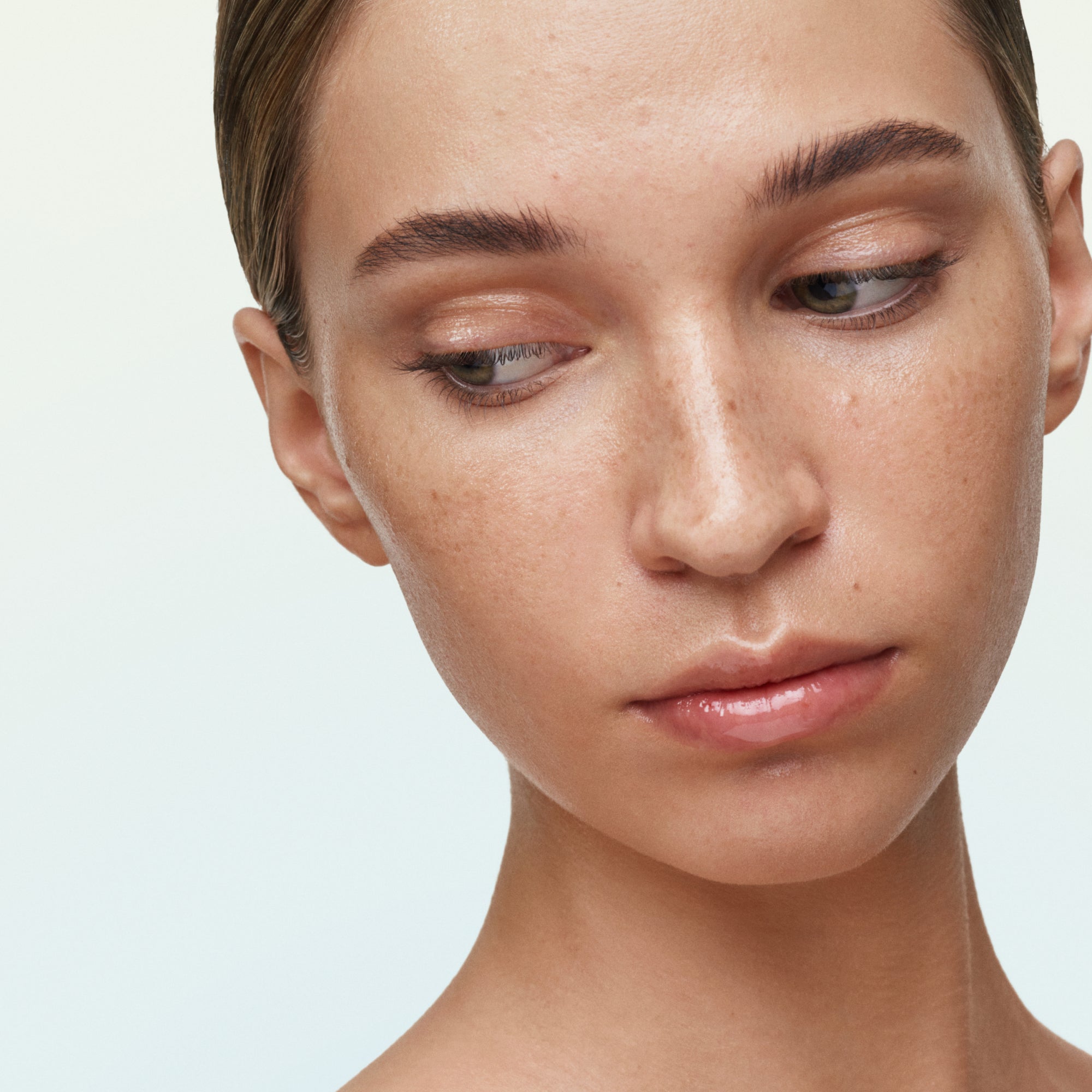 Model wearing U Beauty's The BARRIER Bioactive Treatment.