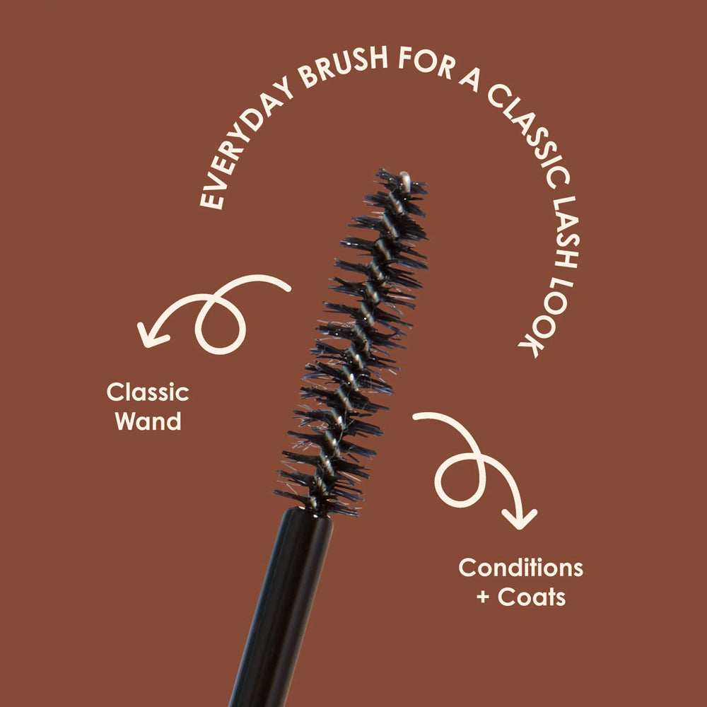 Mascara brush with text on a brown background