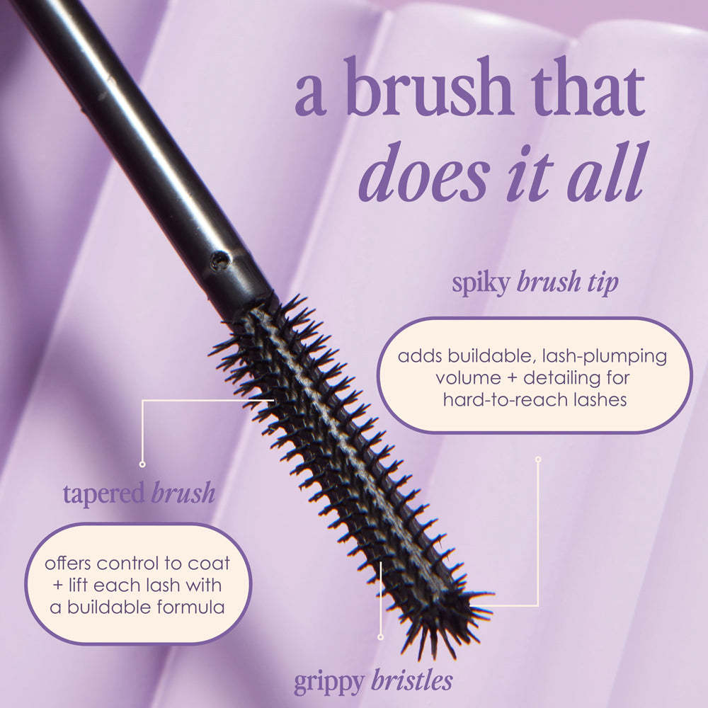 Mascara brush with features highlighted on a purple background
