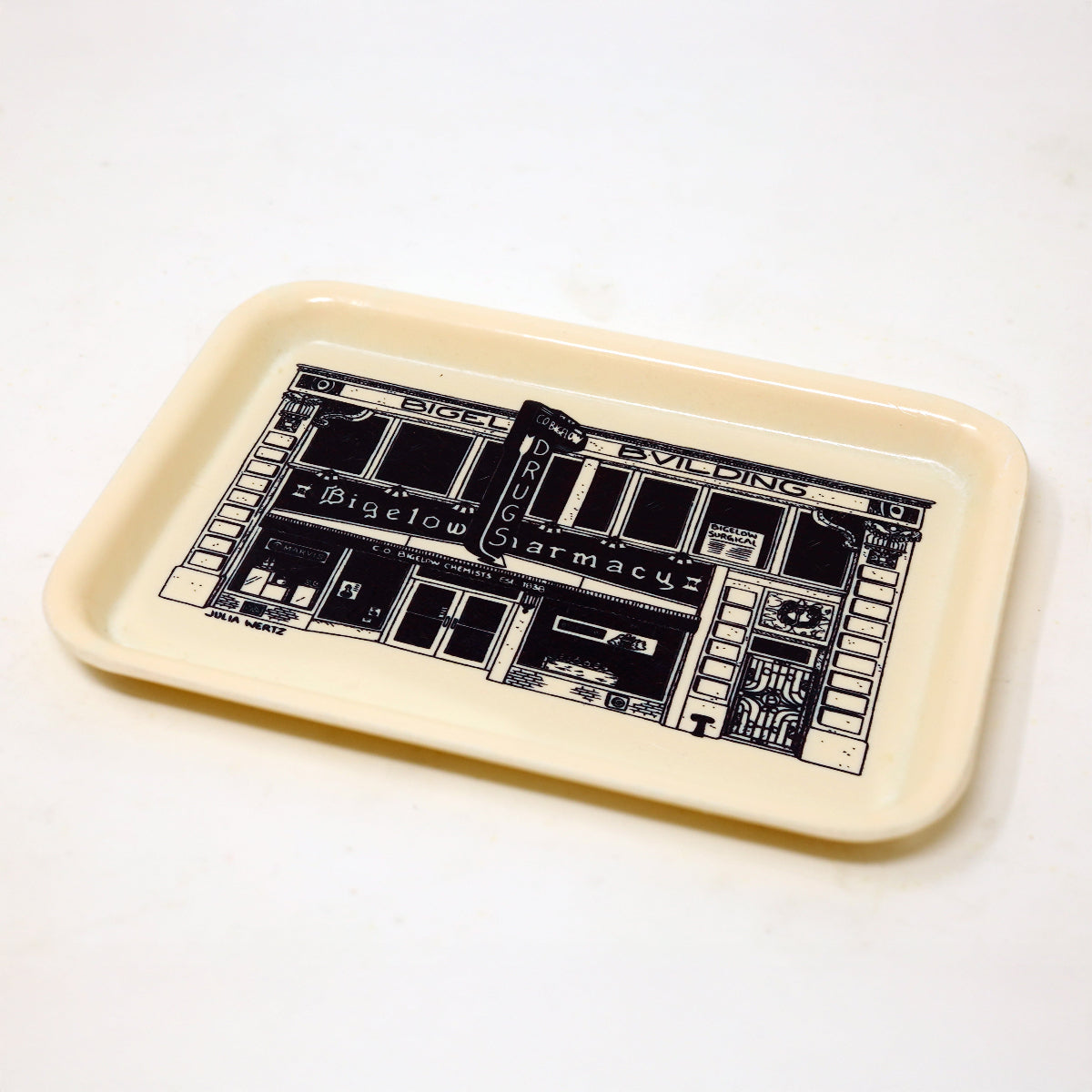 Rectangular tray with black design on a white background