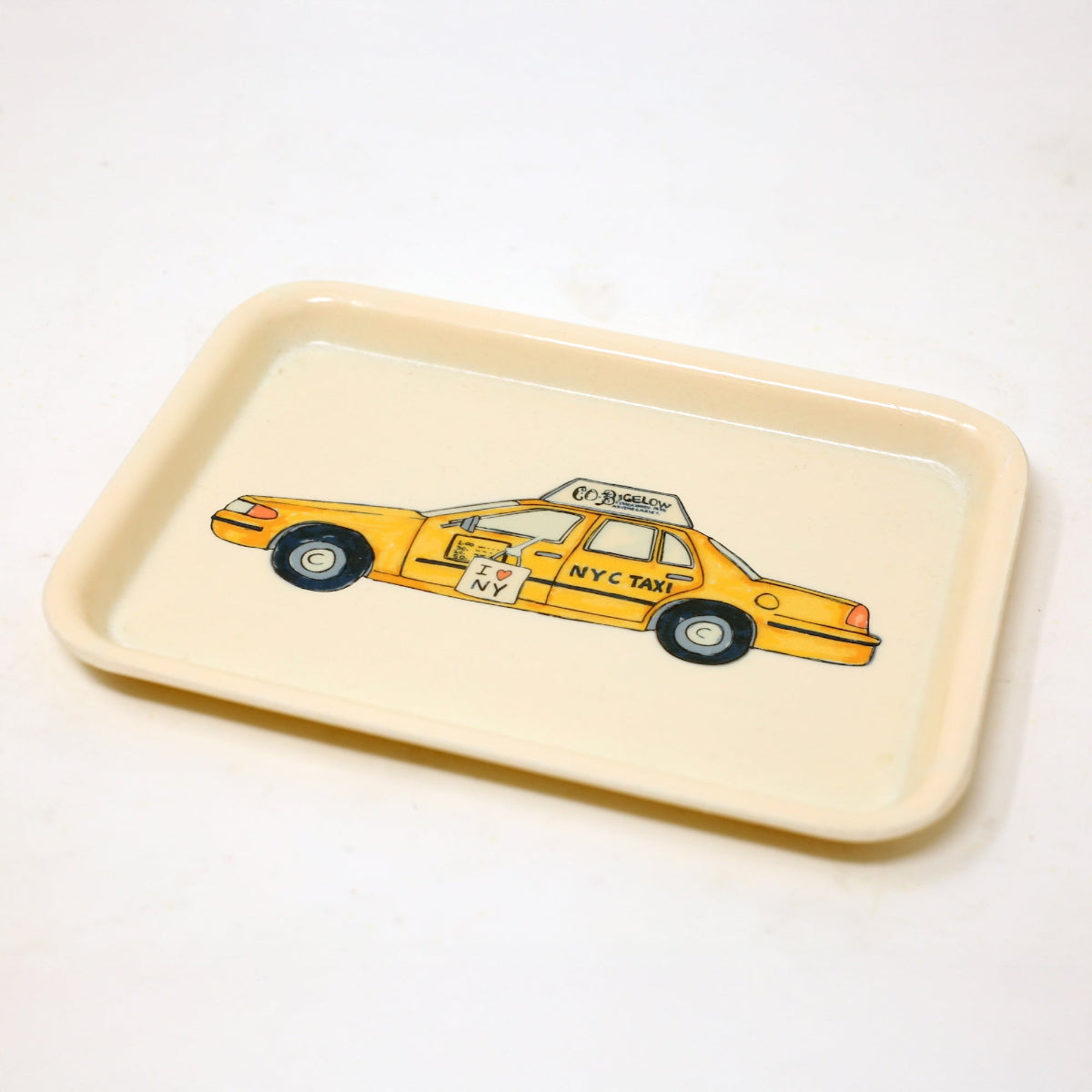 Rectangular tray with a New York City taxi design on a white background