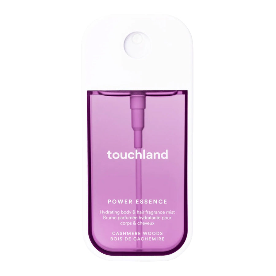 Touchland Power Essence Hydrating Body & Hair Mist - Cashmere Woods in a purple translucent bottle with a white cap, on a plain white background.