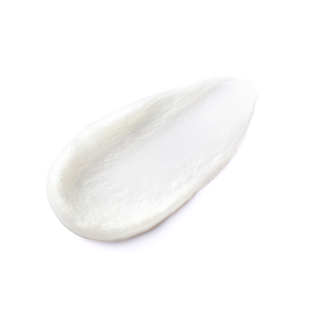 A smooth, teardrop-shaped smear of Mixsoon Centella Cleansing Foam on a solid white background.