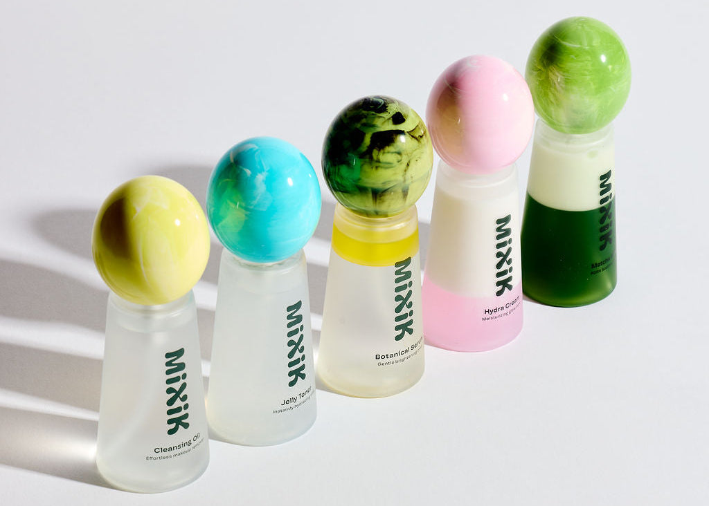 Mixik Facial Sprays lined up on a white background.