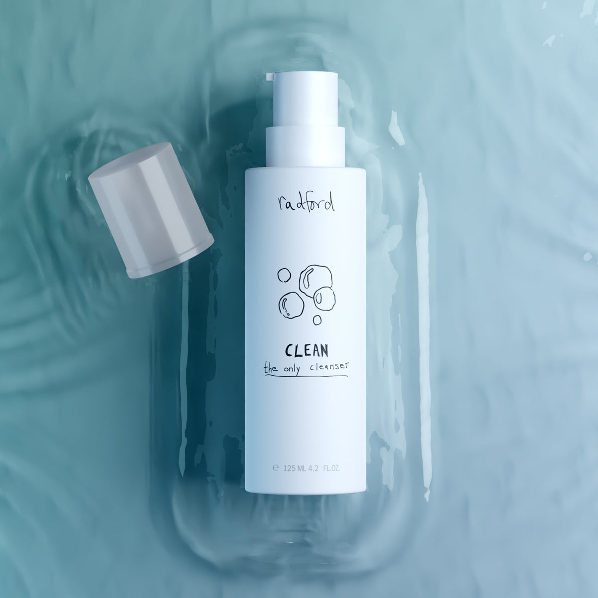 White bottle of Radford Clean - the only cleanser on a blue water background