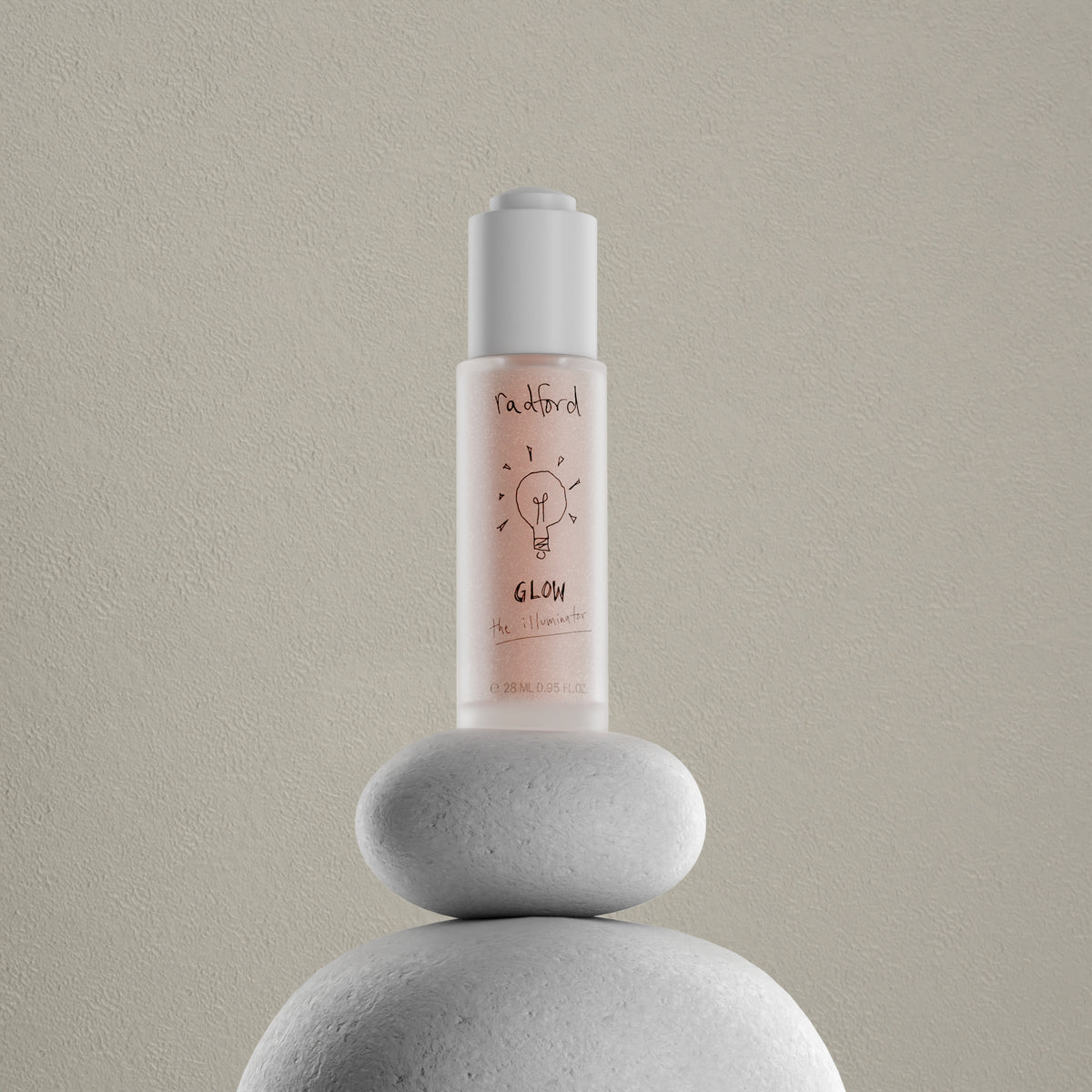 A bottle of Radford Glow the Illuminator, displayed on a stack of three textured gray stones against a neutral beige background.