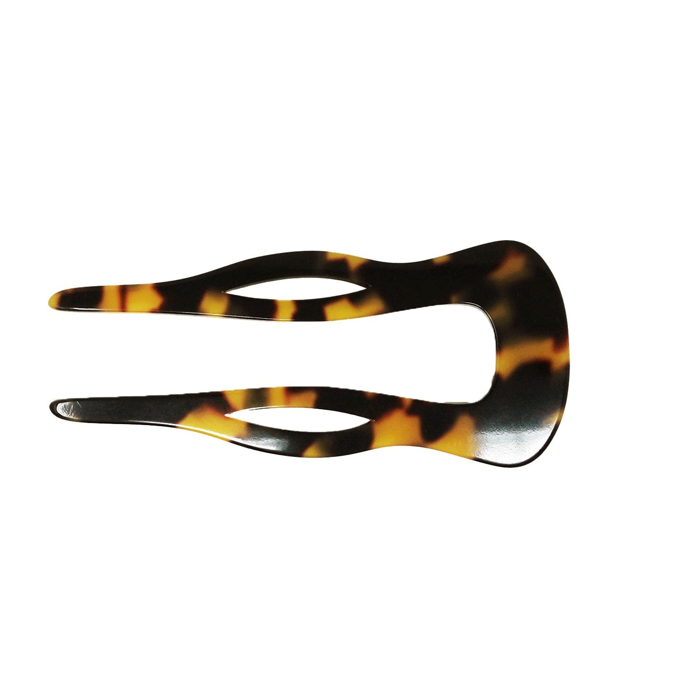 Tortoiseshell hair clip on a white background
