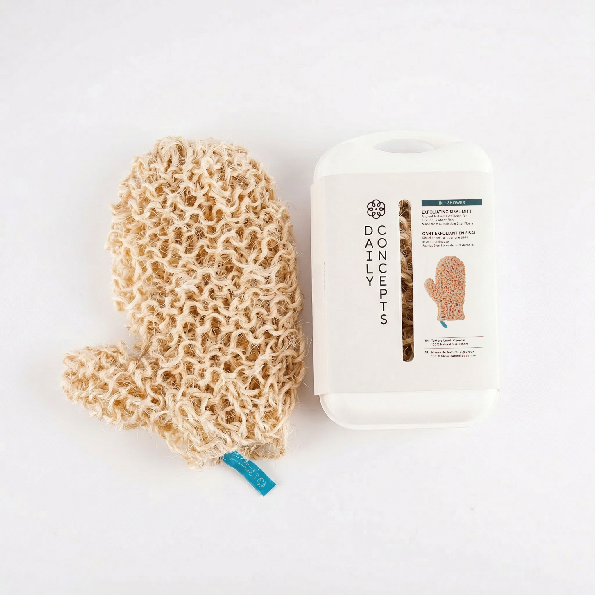 Glove next to its packaging on a white background