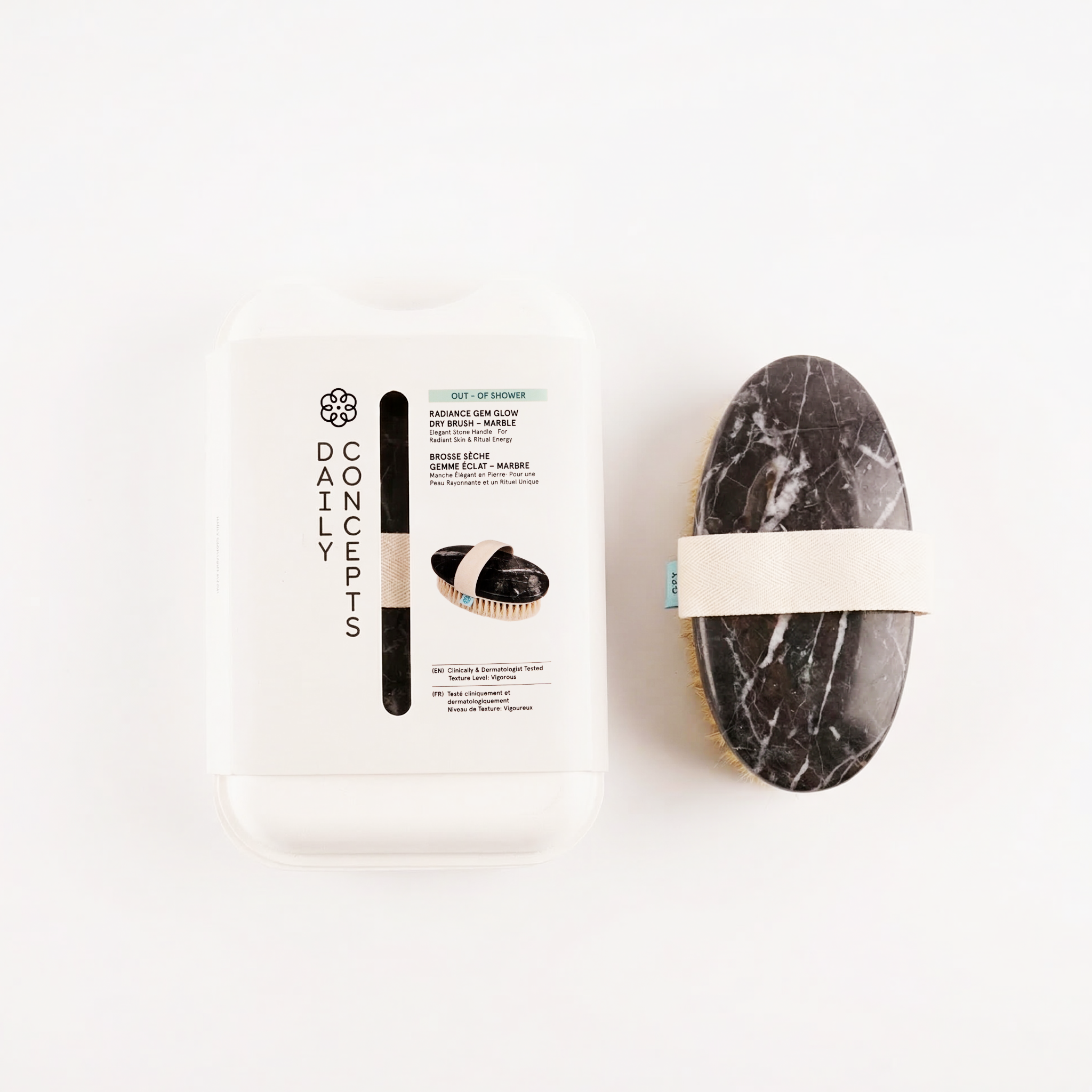 Marble-textured oval brush with packaging on a white background