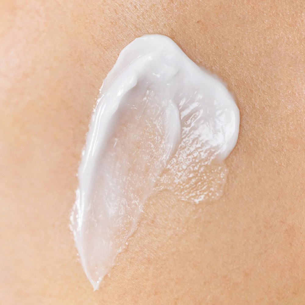 White cream applied to skin