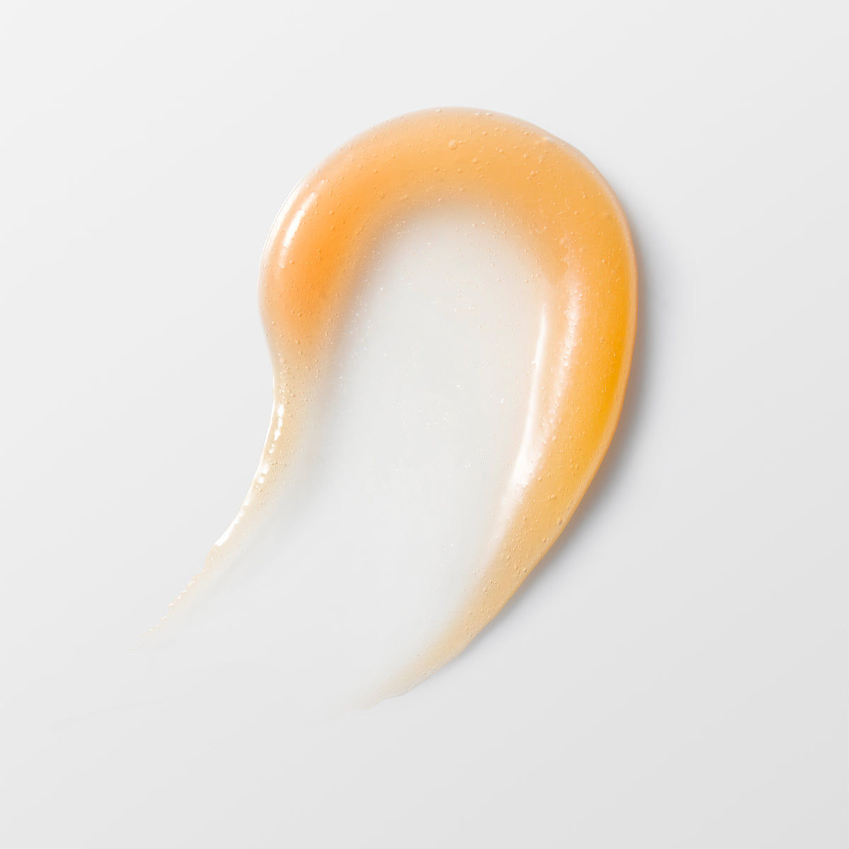 Close-up of an orange product swatch on a white background
