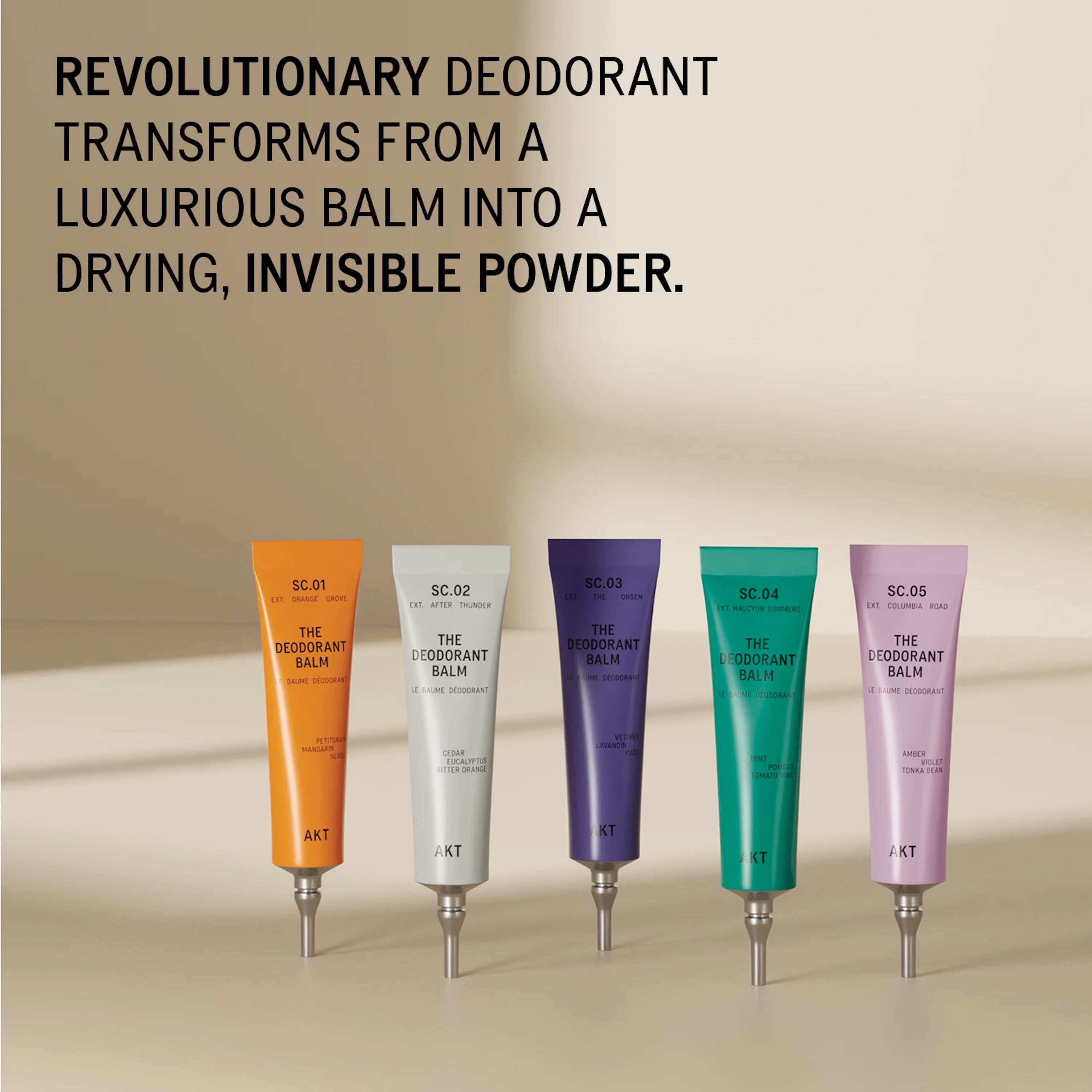Five tubes of AKT 'The Deodorant Balm' on a beige surface with text above reading 'REVOLUTIONARY DEODORANT TRANSFORMS FROM A LUXURIOUS BALM INTO A DRYING, INVISIBLE POWDER.'.